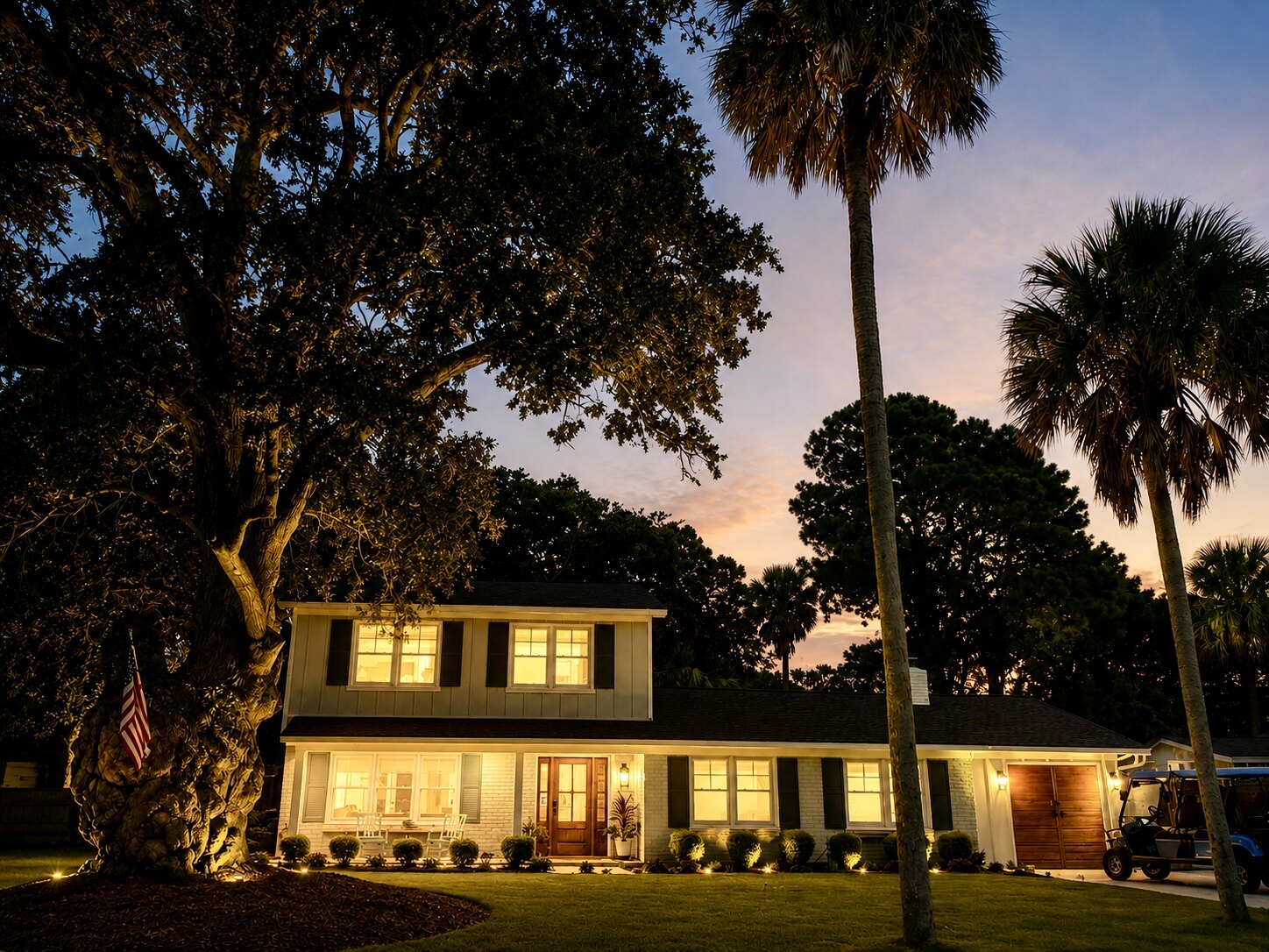12 20th Avenue at twilight, palms overhead and windows glowing